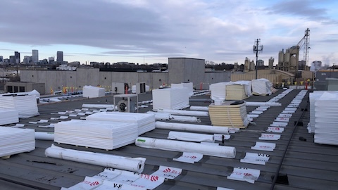 roofing contractor doing project on roof